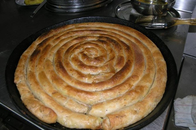 Balkan pita making culinary experience - Waiting for the pita to bake