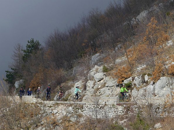 Express Cable Car ascent & 25Turns Epic Bike Descent. - The 25-turn descent through Lovcen