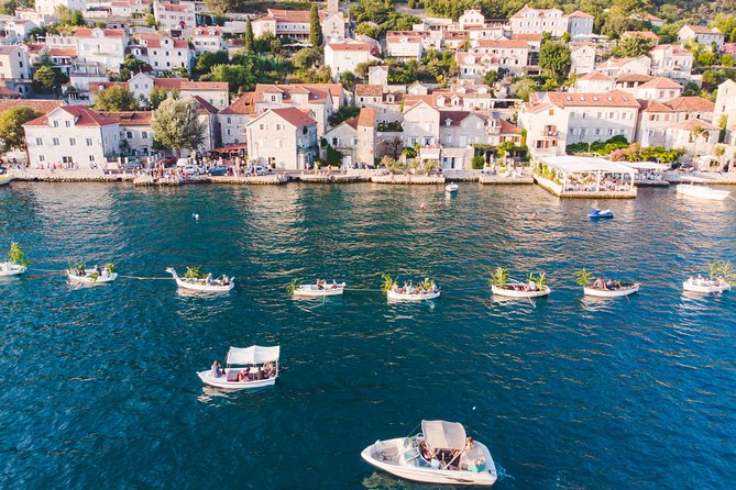 Private Boat for Large Groups: Blue Cave & Lady of the Rocks - Perast passes by in a Venetian-era setting