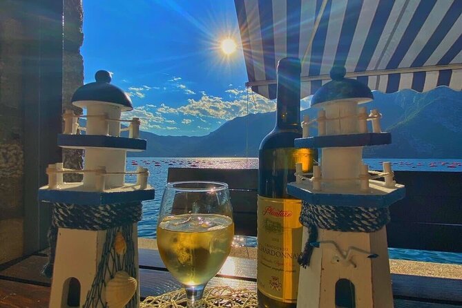 Private Gastro Cruise: Blue Cave & Organic Seaside Lunch - Leaving Kotor beneath the fortress walls